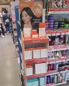 Top-shelf Lilyeve display at Watsons Singapore